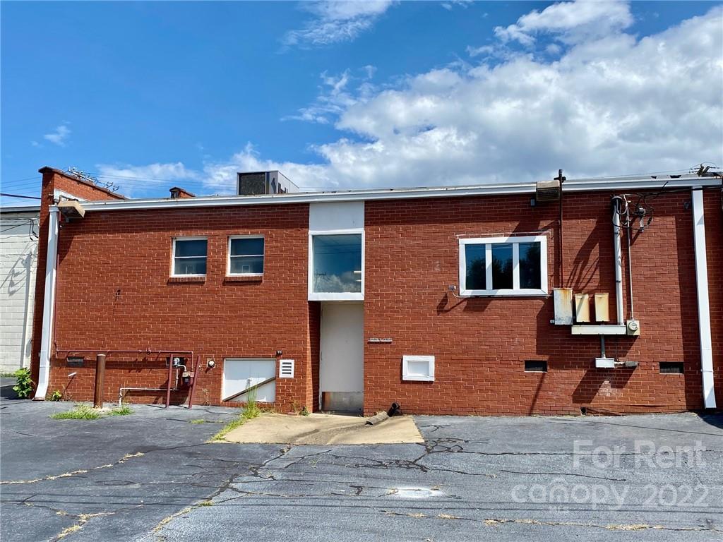 1119 2nd Street Northeast, Unit C Hickory, NC 28601 - Photo 2 of 16 a front view of a house with garden
