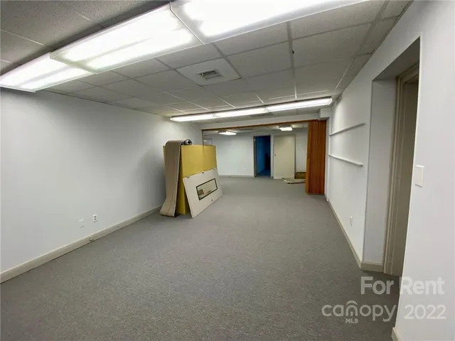 a view of a livingroom with a staircase