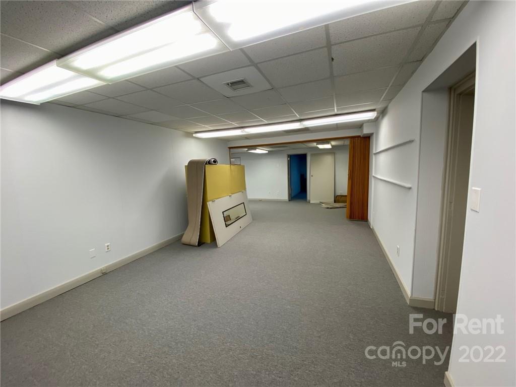 1119 2nd Street Northeast, Unit C Hickory, NC 28601 - Photo 9 of 16 a view of a livingroom with a staircase