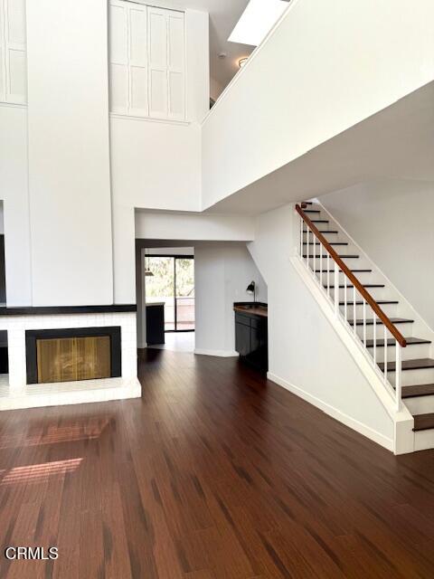 1213 Calle Lozano Camarillo, CA 93012 - Photo 1 of 29 a view of an empty room with wooden floor and a window