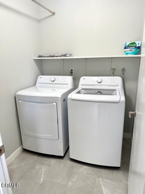 1213 Calle Lozano Camarillo, CA 93012 - Photo 12 of 29 a utility room with dryer and washer