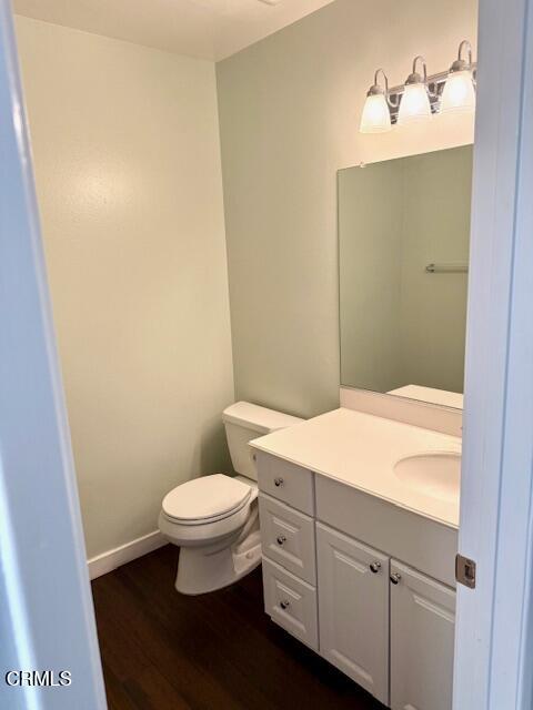 1213 Calle Lozano Camarillo, CA 93012 - Photo 5 of 29 a bathroom with a granite countertop toilet and a sink