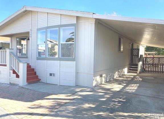 348 Acadia Lane, Unit 348 San Rafael, CA 94903 - Photo 1 of 1 a view of a house with a backyard
