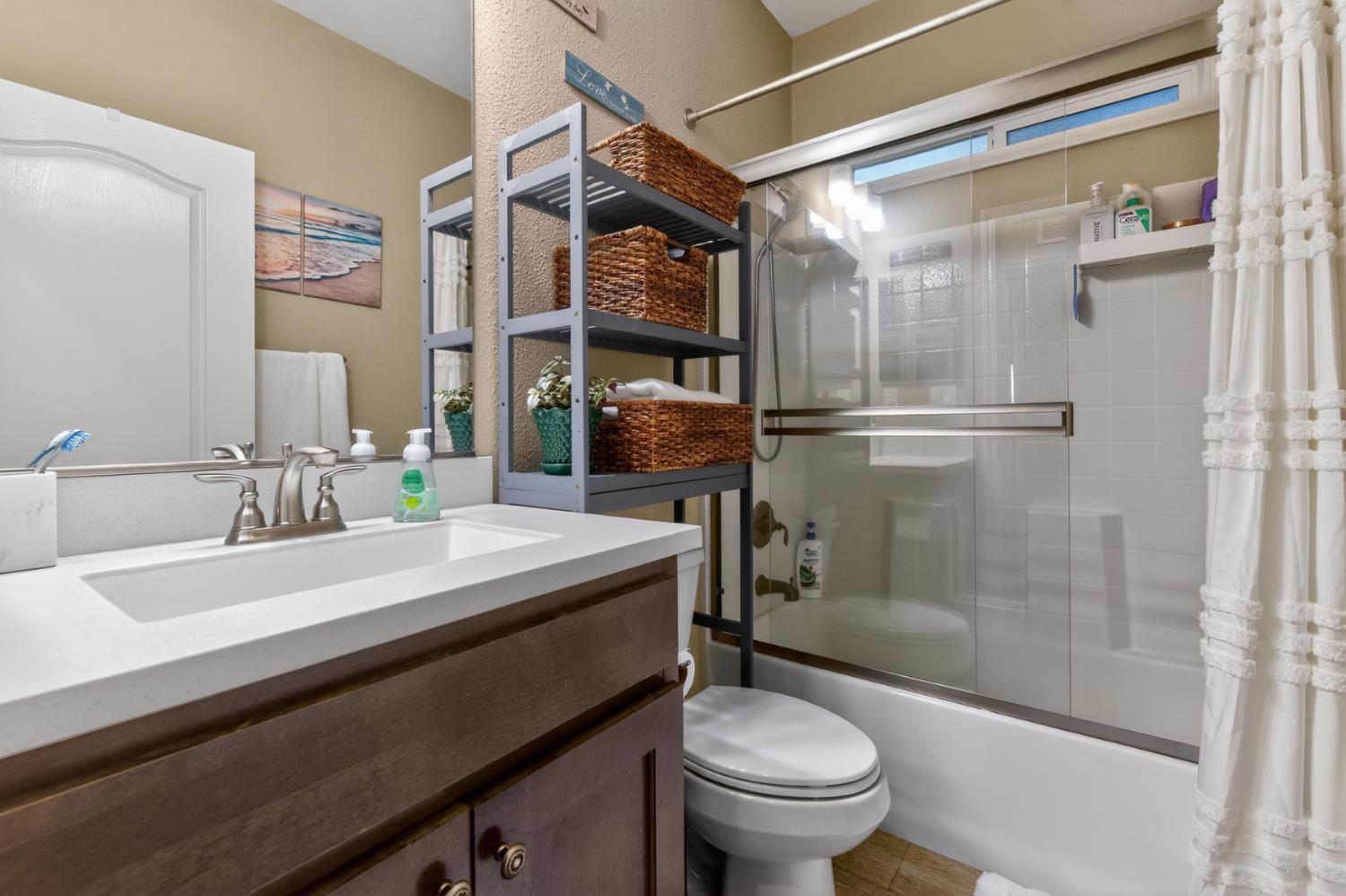 7570 Airola Road Vallecito, CA 95251 - Photo 64 of 90 a bathroom with a sink a toilet and shower