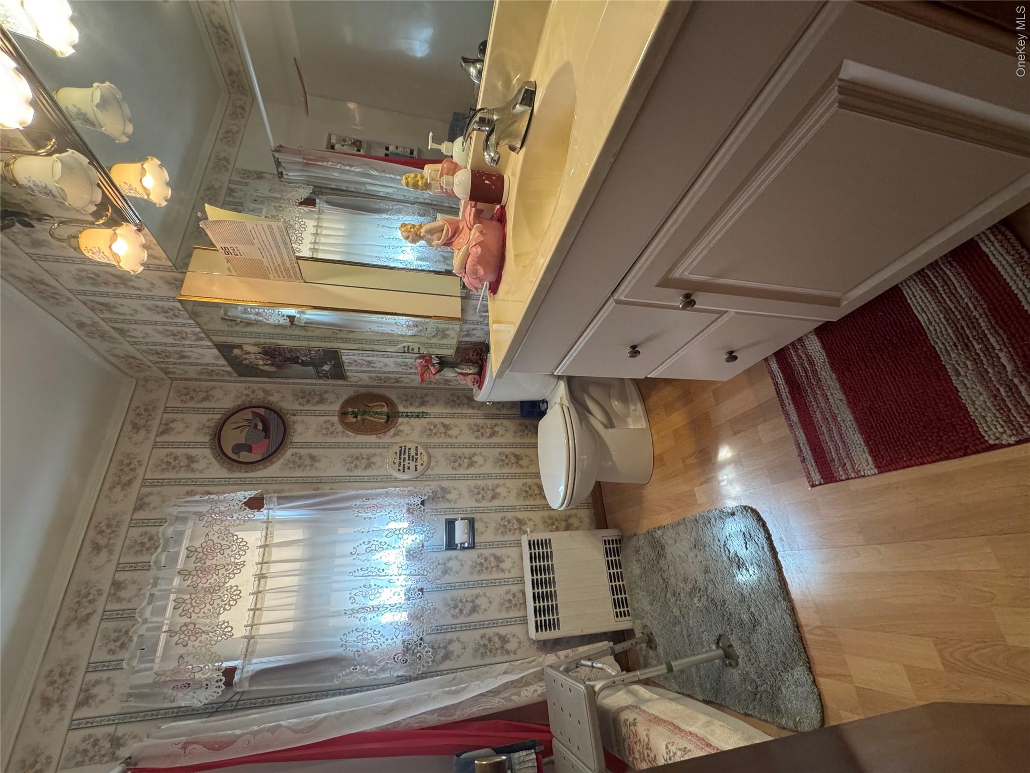 367 Mt Eve Road Goshen, NY 10924 - Photo 28 of 37 a bathroom with a sink a large mirror and vanity