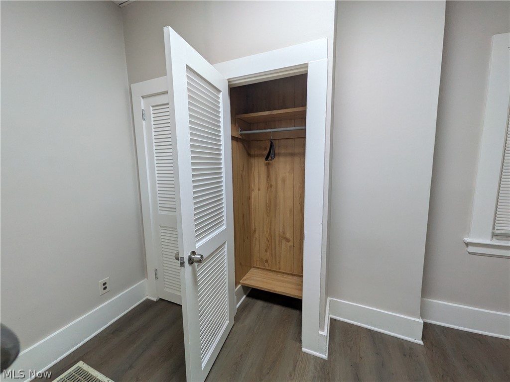 1881 Manchester Road, Unit 1 Akron, OH 44314 - Photo 28 of 44 1881 Manchester Rd, Akron, OH 44314 Unit #1 ground floor access and living. Welcome to this spacious 2-bedroom, 1-bathroom first-floor generous and remodeled apartment in the Kenmore neighborhood of Akron, offering a great amount of comfortable living space. This move-in ready apartment features LVP flooring throughout, a spacious living room, room for dining, separate kitchen with a gas range and stainless steel refrigerator, two bedrooms, and a full private bathroom which has a convenient step-in shower. Large windows provide natural light, while ample closets offer plenty of storage. Enjoy off-street parking and a backyard with a picnic table and small firepit, providing a pleasant outdoor space to relax and enjoy for the buildings tenants.