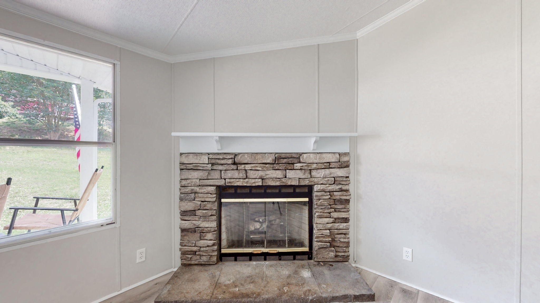 5023 Benders Ferry Road Mount Juliet, TN 37122 - Photo 12 of 62 a living room with a fireplace in it