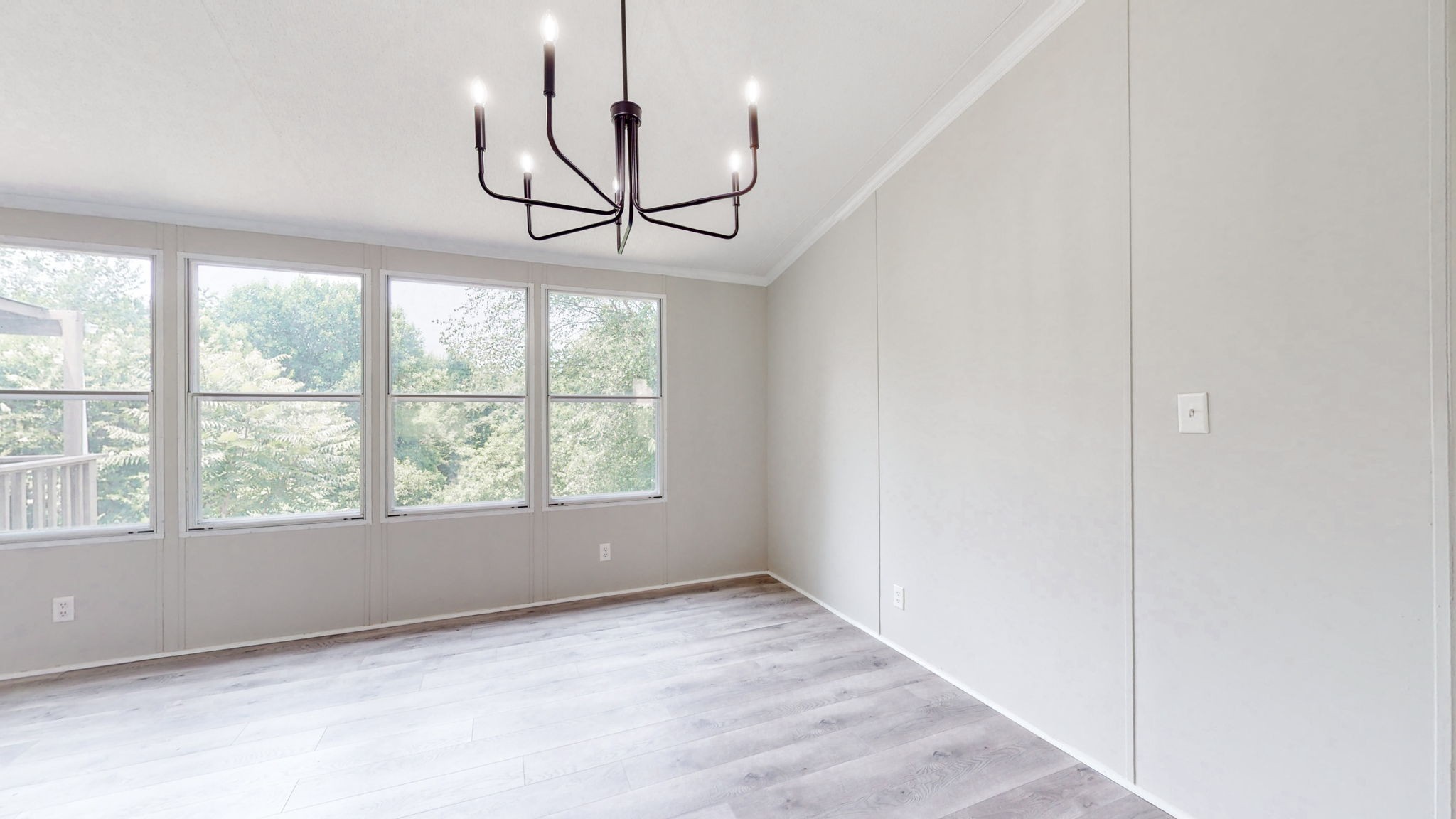 5023 Benders Ferry Road Mount Juliet, TN 37122 - Photo 15 of 62 a view of an empty room with wooden floor and window