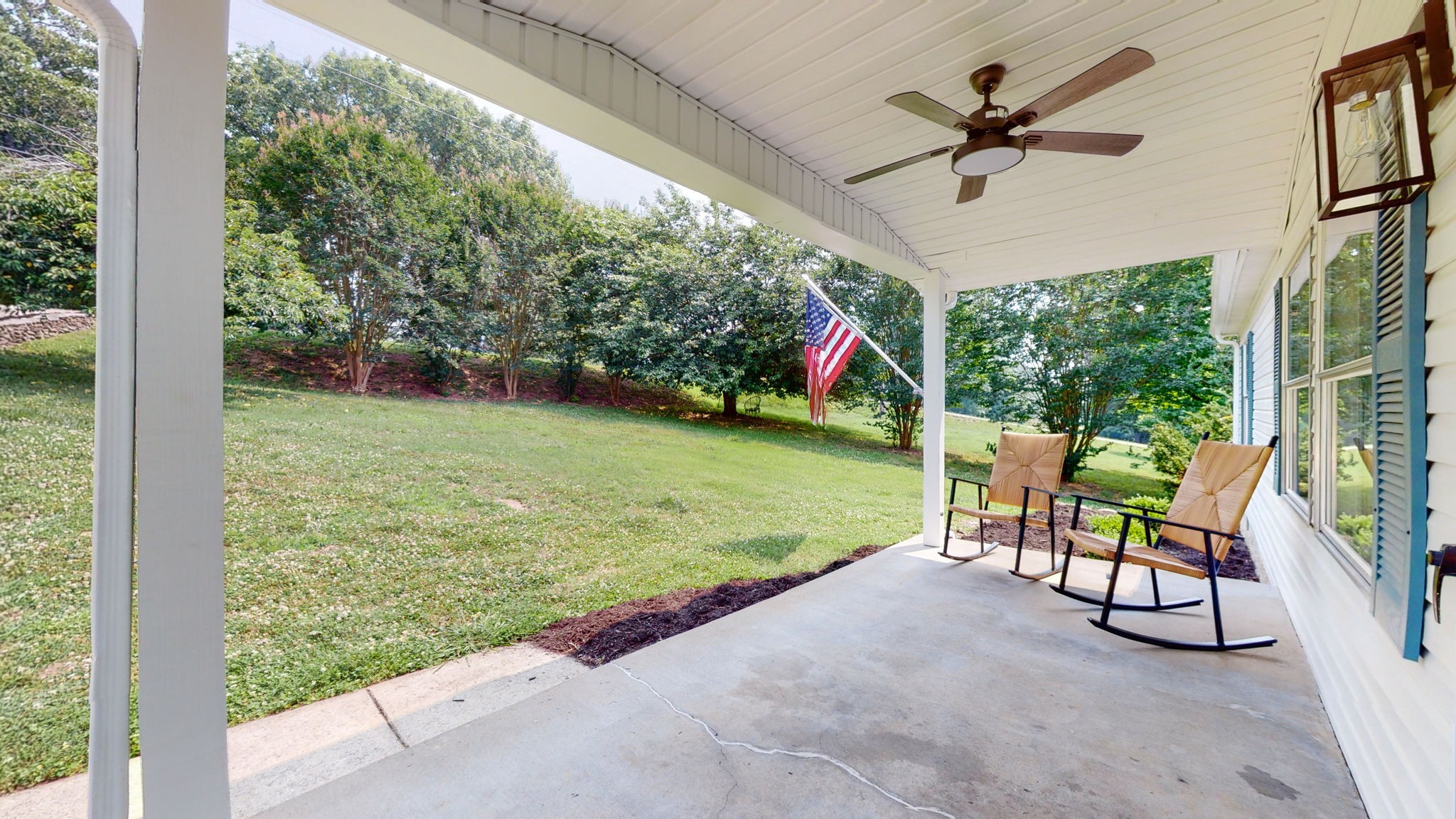 5023 Benders Ferry Road Mount Juliet, TN 37122 - Photo 24 of 62 a view of a porch with furniture and a yard