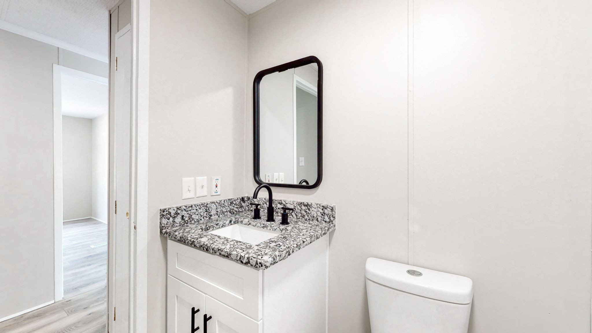 5023 Benders Ferry Road Mount Juliet, TN 37122 - Photo 28 of 62 a bathroom with a granite countertop sink and a mirror