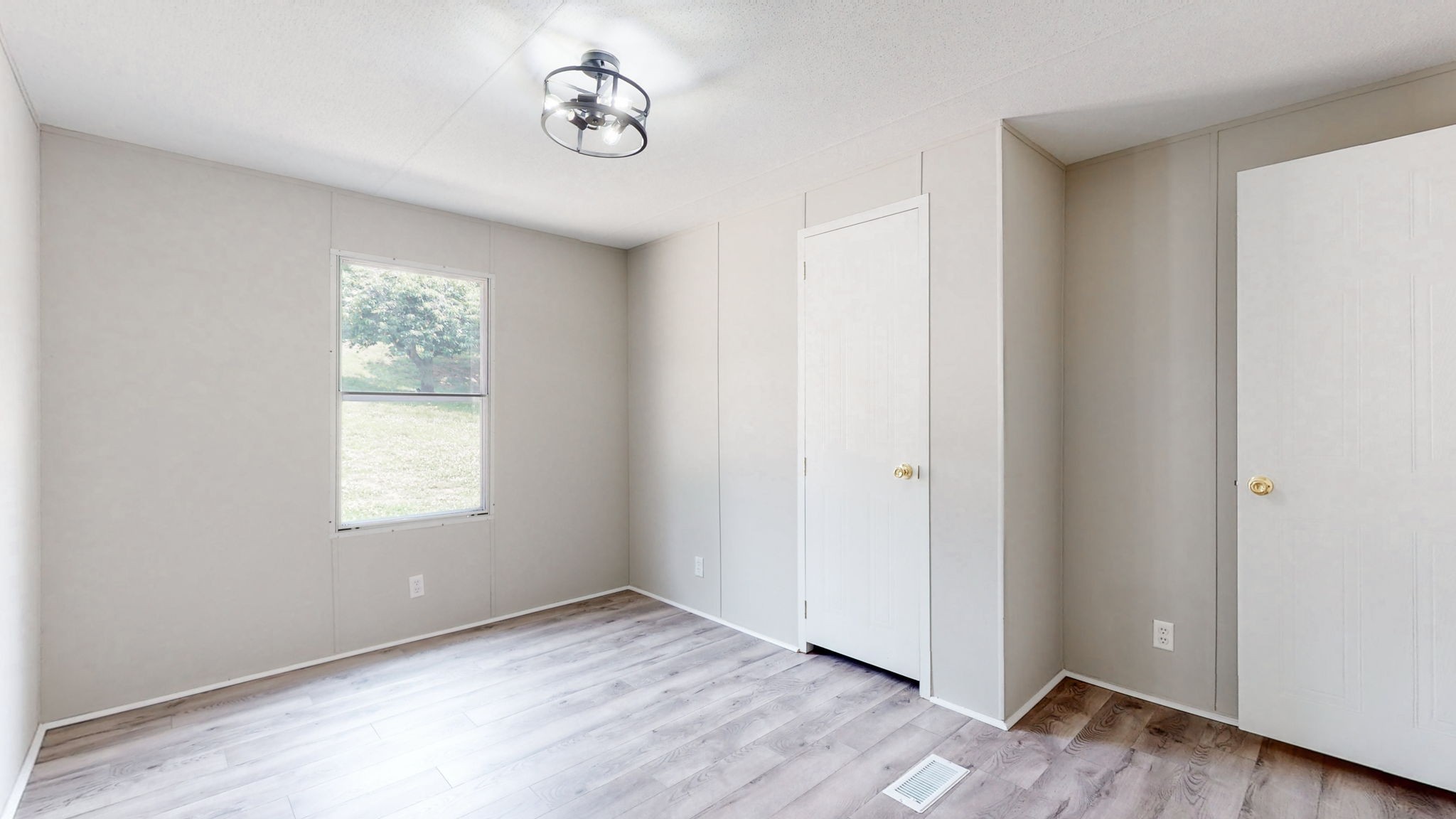 5023 Benders Ferry Road Mount Juliet, TN 37122 - Photo 33 of 62 an empty room with wooden floor and window