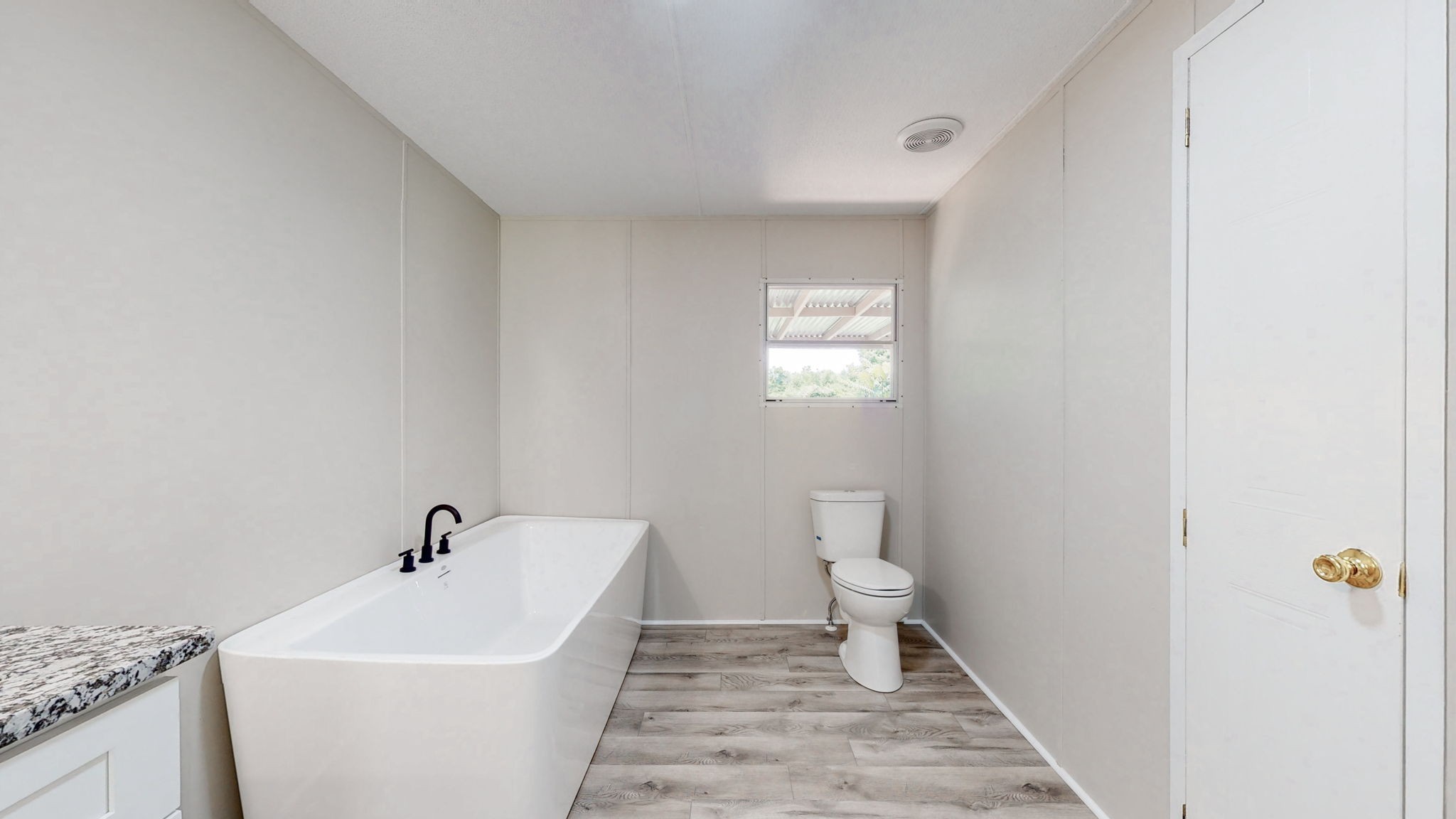 5023 Benders Ferry Road Mount Juliet, TN 37122 - Photo 38 of 62 a white bath tub sitting next to a white toilet