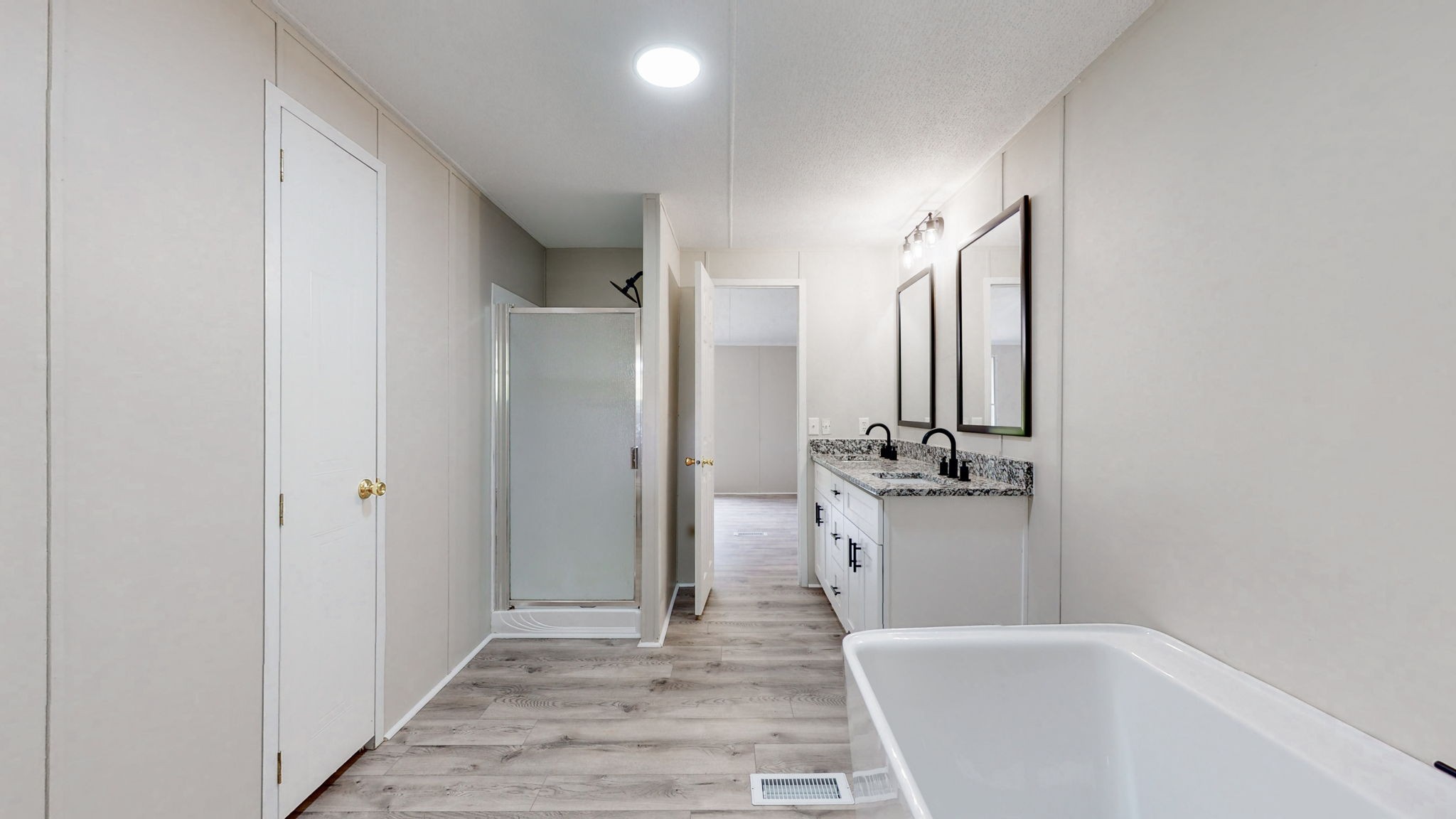 5023 Benders Ferry Road Mount Juliet, TN 37122 - Photo 39 of 62 a bathroom with a tub and a sink