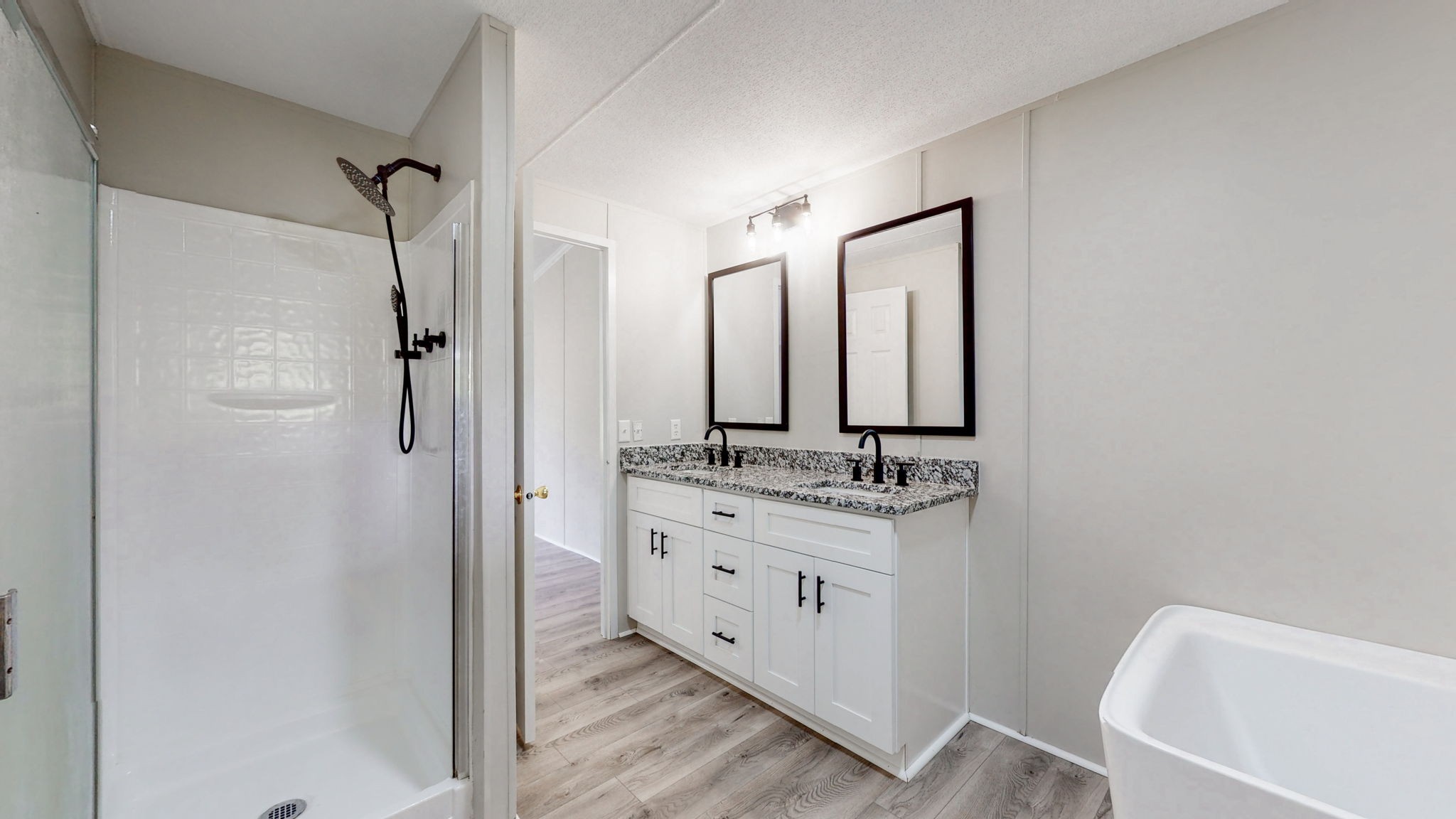 5023 Benders Ferry Road Mount Juliet, TN 37122 - Photo 43 of 62 a bathroom with a double vanity sink mirror and shower