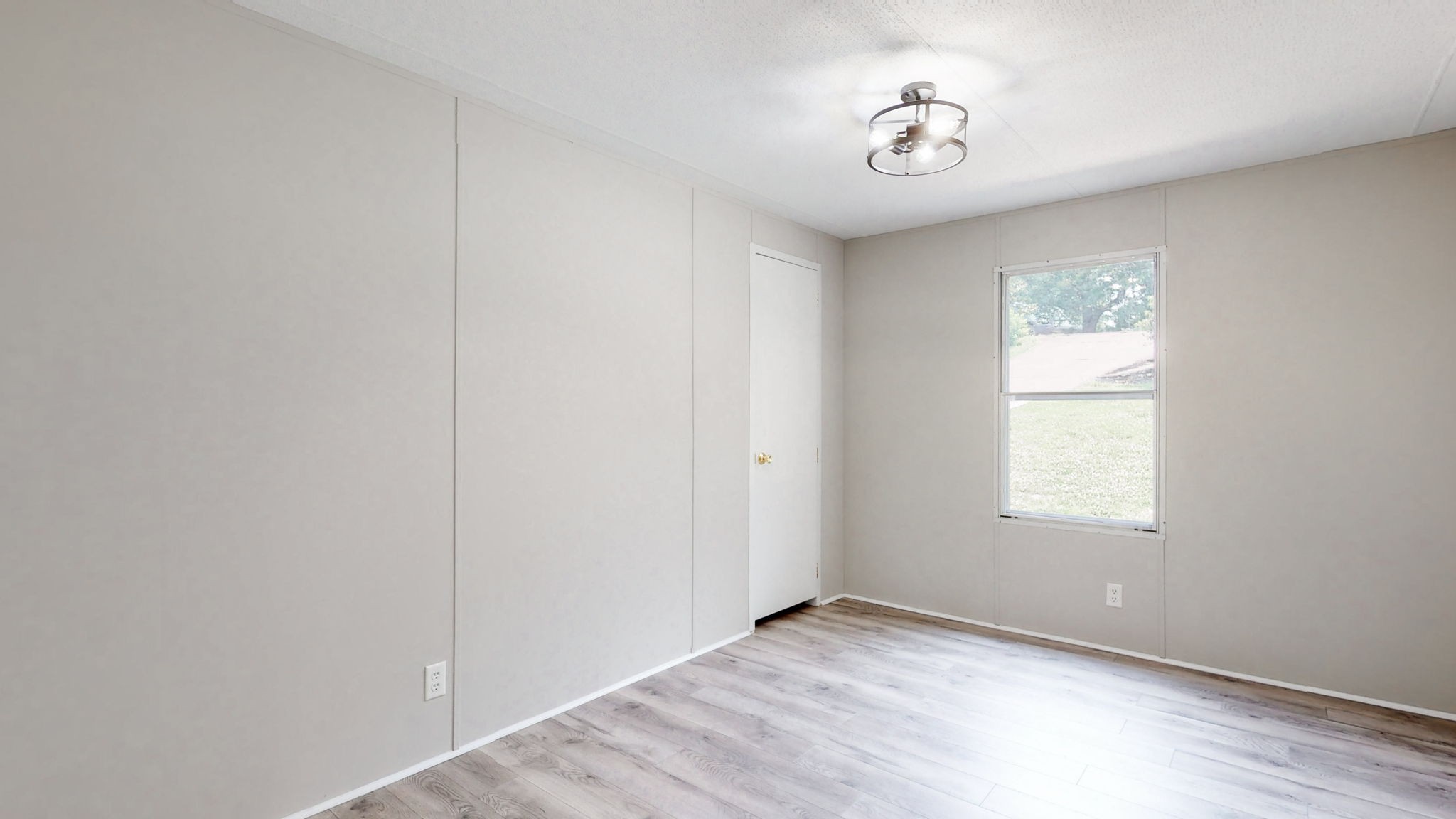 5023 Benders Ferry Road Mount Juliet, TN 37122 - Photo 5 of 62 an empty room with windows and fan