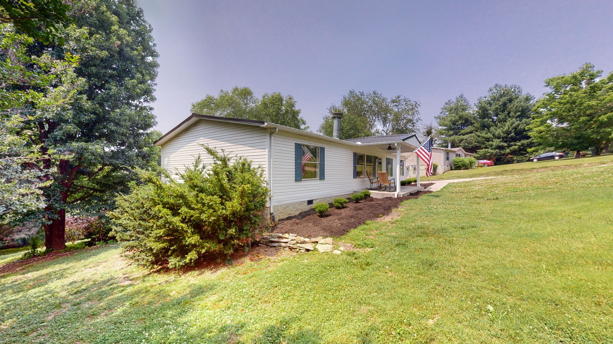 5023 Benders Ferry Road Mount Juliet, TN 37122 - Photo 58 of 62 a front view of a house with a yard and garage