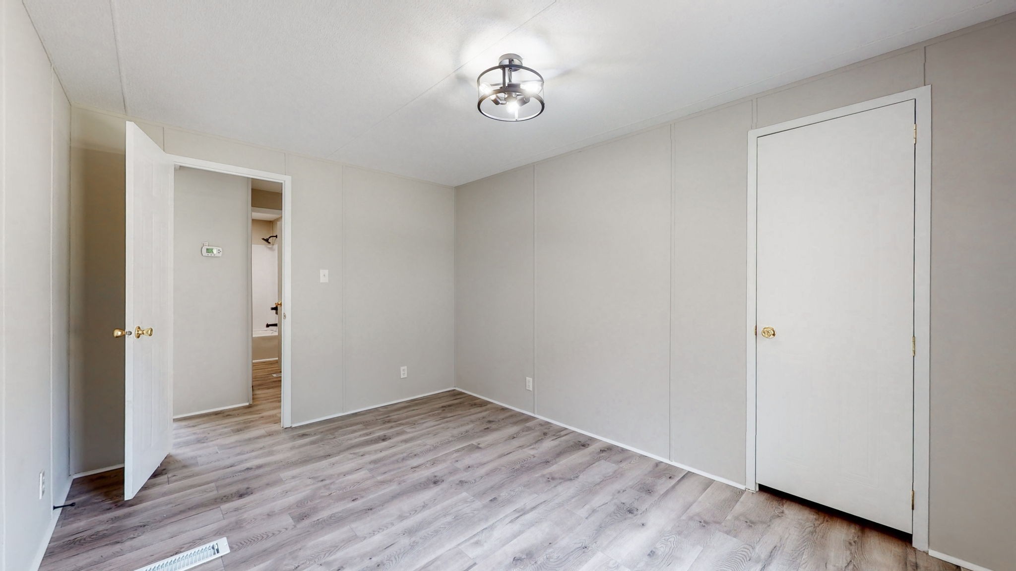 5023 Benders Ferry Road Mount Juliet, TN 37122 - Photo 7 of 62 an empty room with wooden floor and window