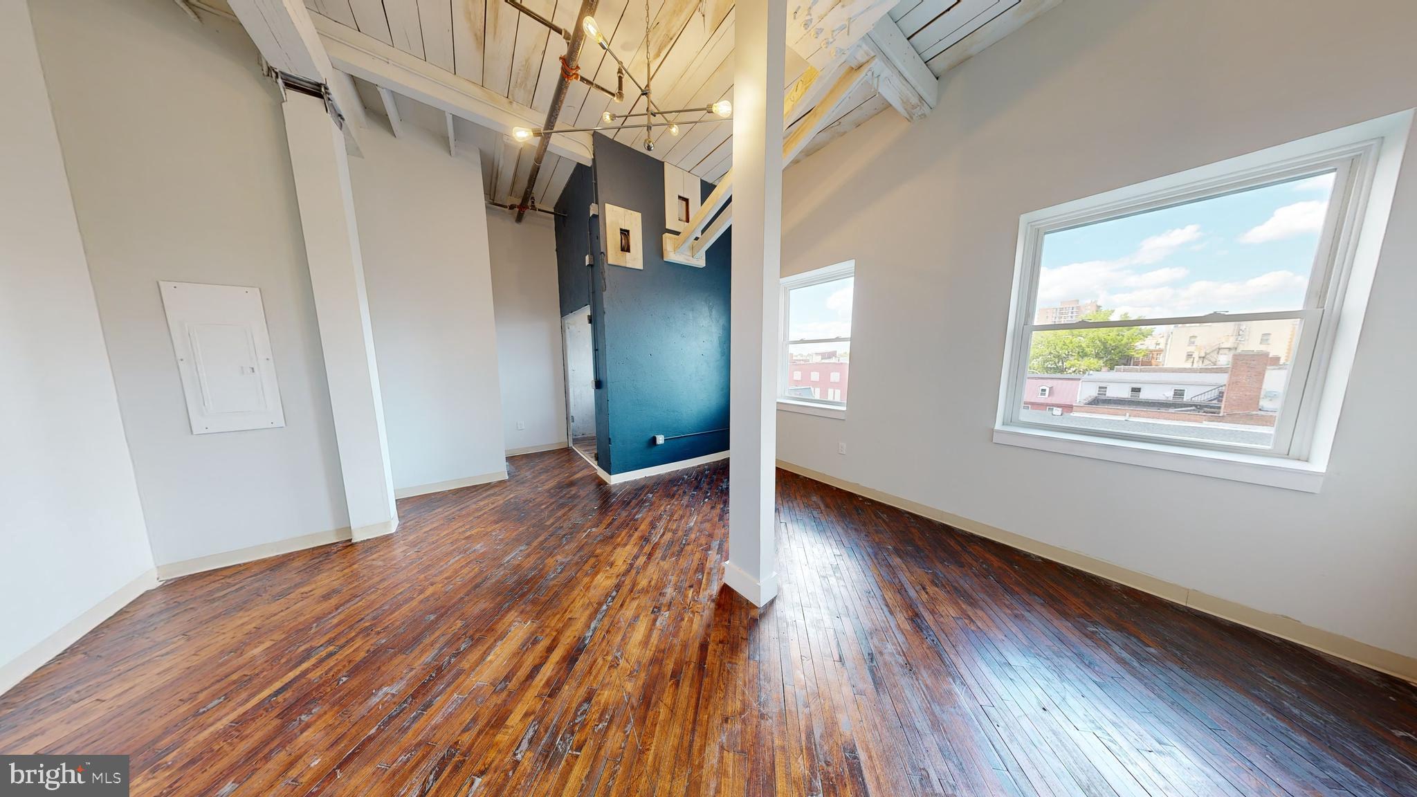 100 South 4th Street, Unit 202 Reading, PA 19602 - Photo 9 of 15 a view of livingroom with hallway and wooden floor