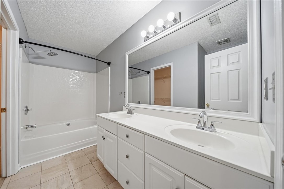 101 Grand Oak Circle Pendleton, SC 29670 - Photo 26 of 40 Dual vanity with integrated sinks and a spacious mirror creates a highly functional bathroom.
