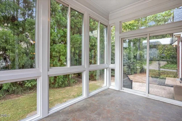 a view of a room with a large window