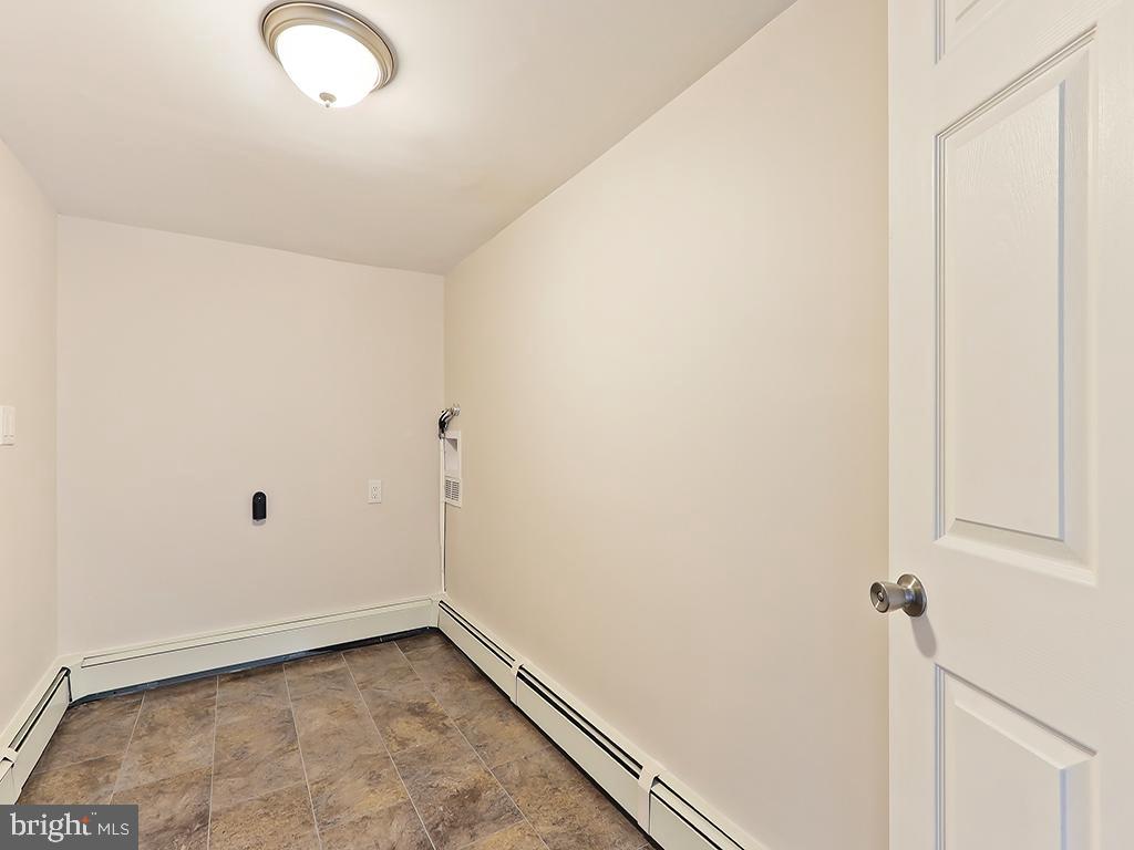 10 Blue Ridge Drive Levittown, PA 19057 - Photo 28 of 31 a view of a room with rack on the wall