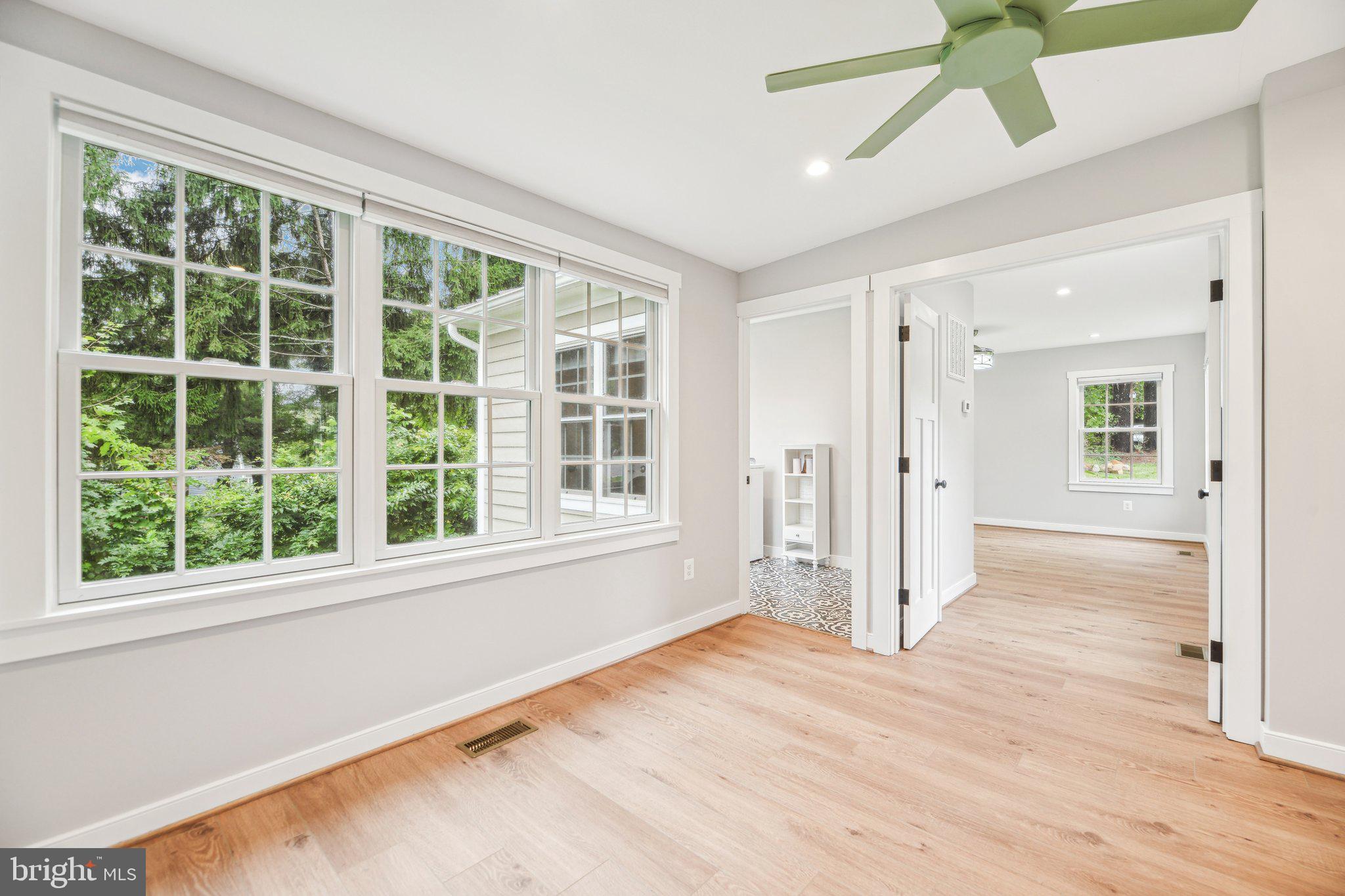 39913 Thomas Mill Road Leesburg, VA 20175 - Photo 27 of 46 a view of empty room with wooden floor and fan
