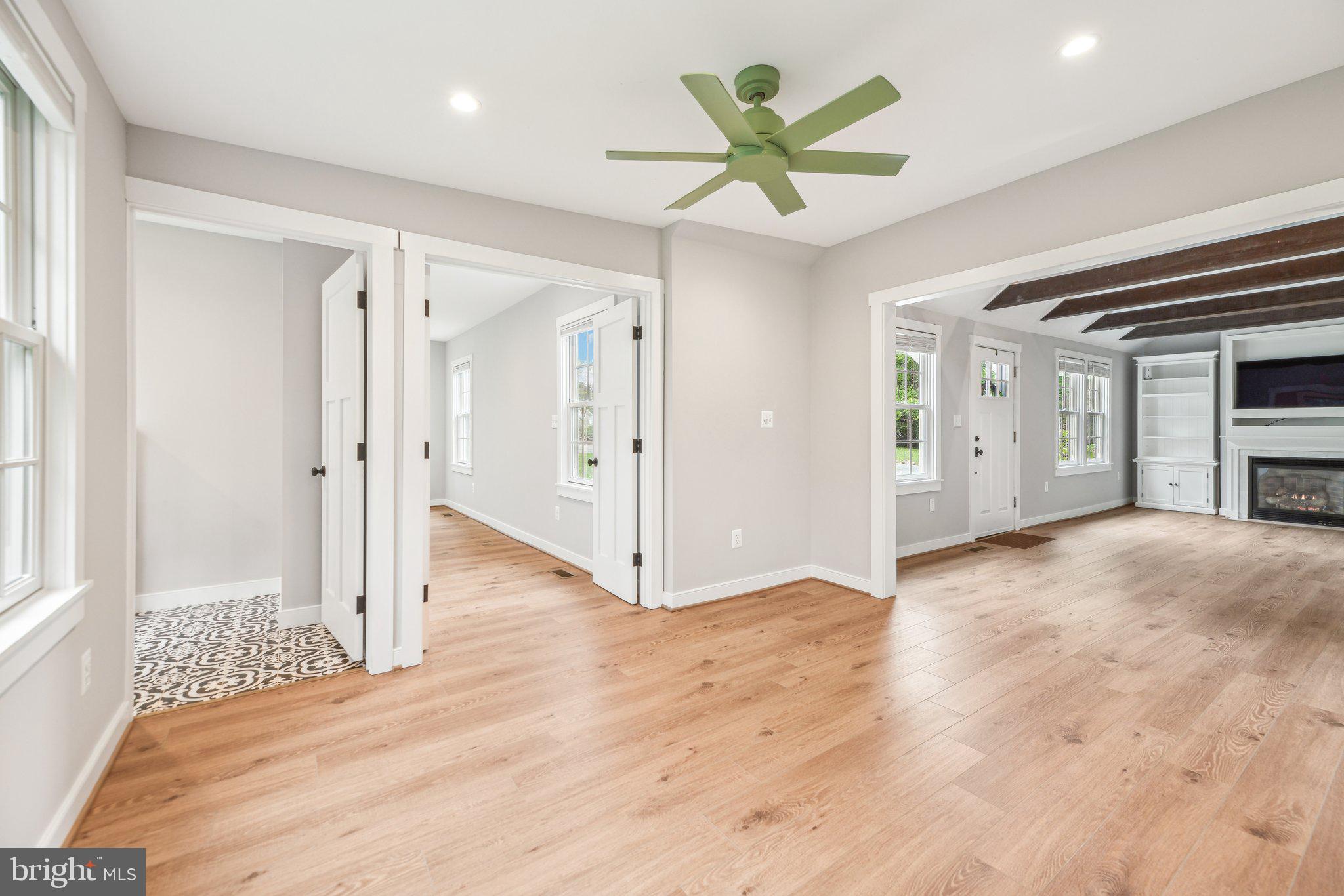 39913 Thomas Mill Road Leesburg, VA 20175 - Photo 28 of 46 a view of livingroom with hardwood floor and a ceiling fan
