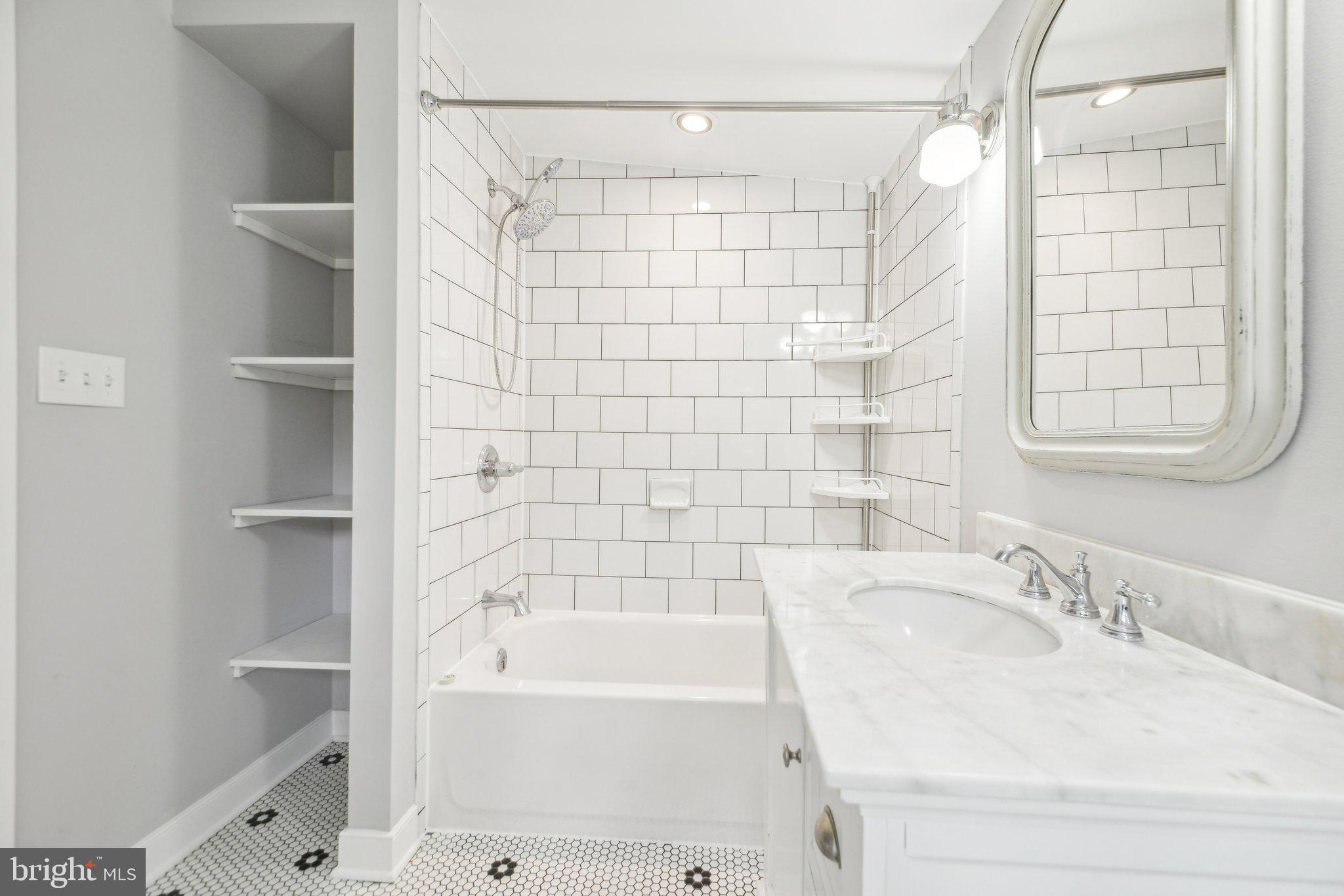 39913 Thomas Mill Road Leesburg, VA 20175 - Photo 36 of 46 a bathroom with a sink and a bathtub