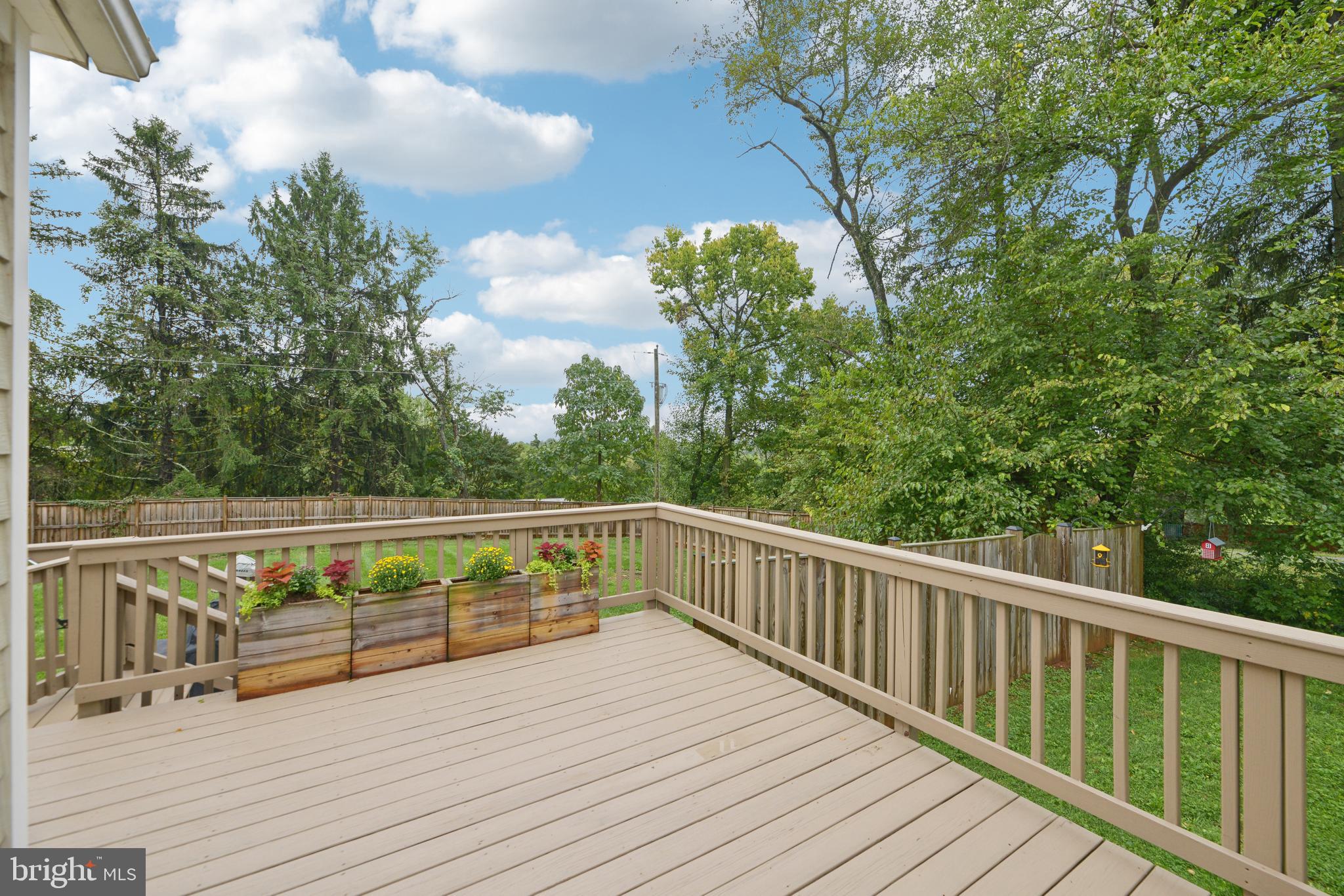 39913 Thomas Mill Road Leesburg, VA 20175 - Photo 39 of 46 a view of balcony with wooden floor and fence
