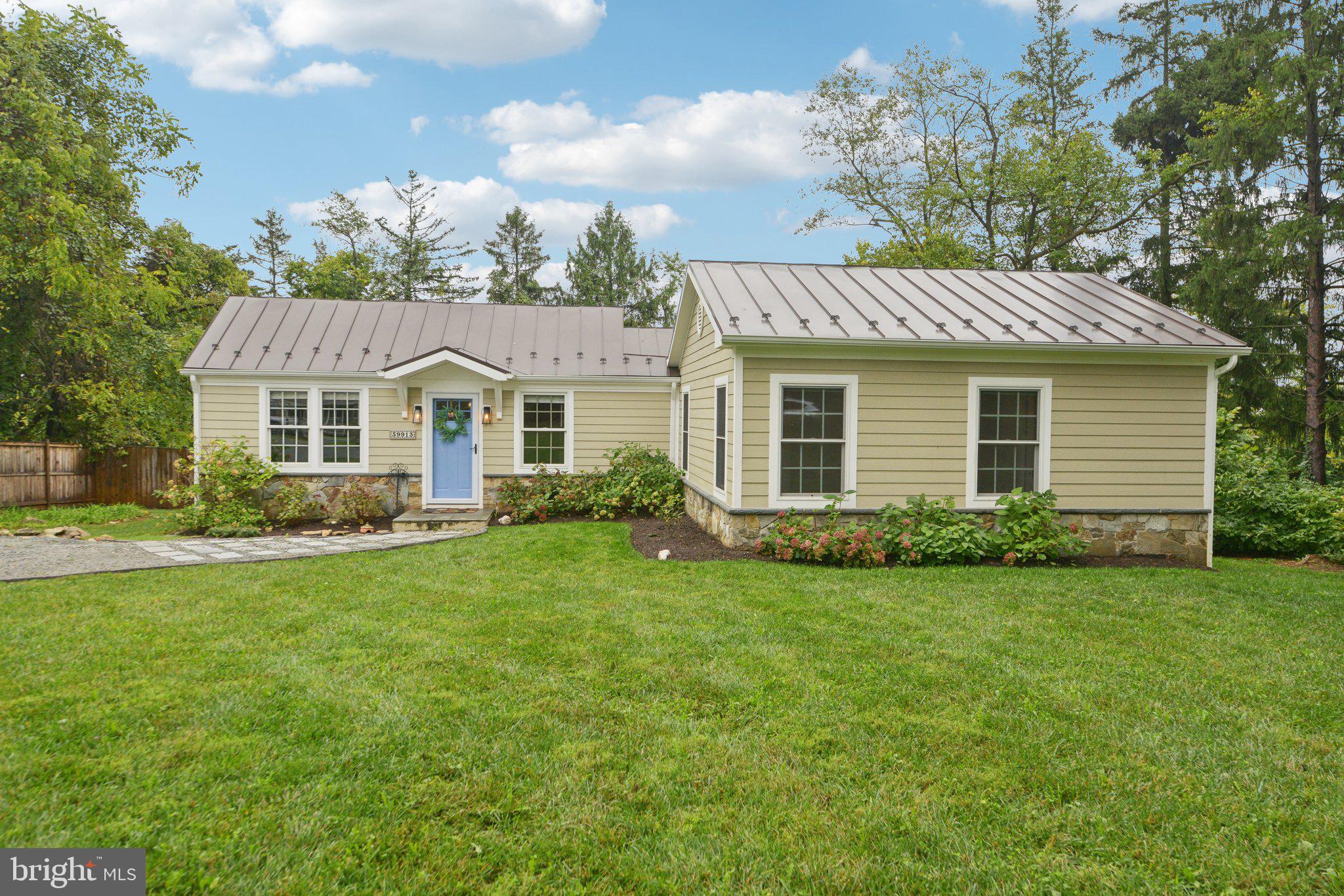 39913 Thomas Mill Road Leesburg, VA 20175 - Photo 44 of 46 a view of a house with a backyard