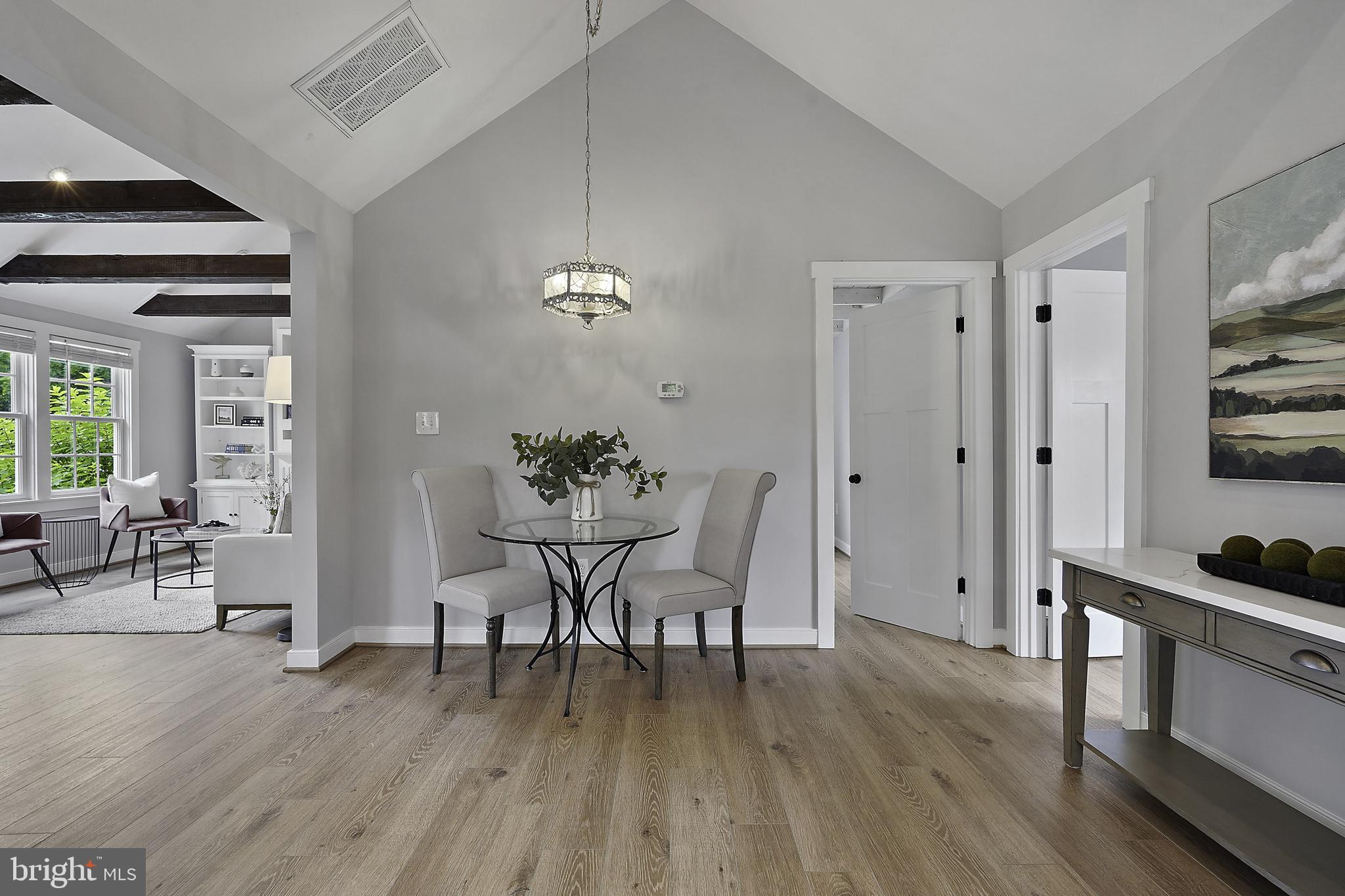 39913 Thomas Mill Road Leesburg, VA 20175 - Photo 8 of 46 a view of a dining room with furniture and wooden floor