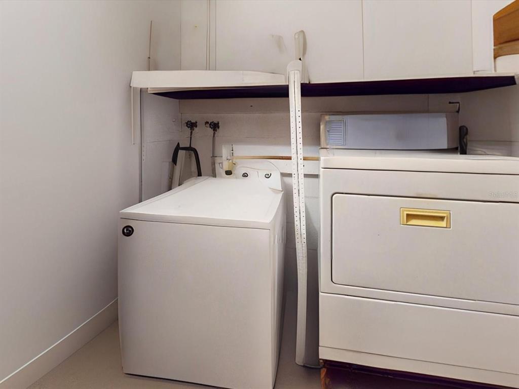 420 Jacks Memorial Road St. Cloud, FL 34769 - Photo 15 of 37 a utility room with dryer and washer