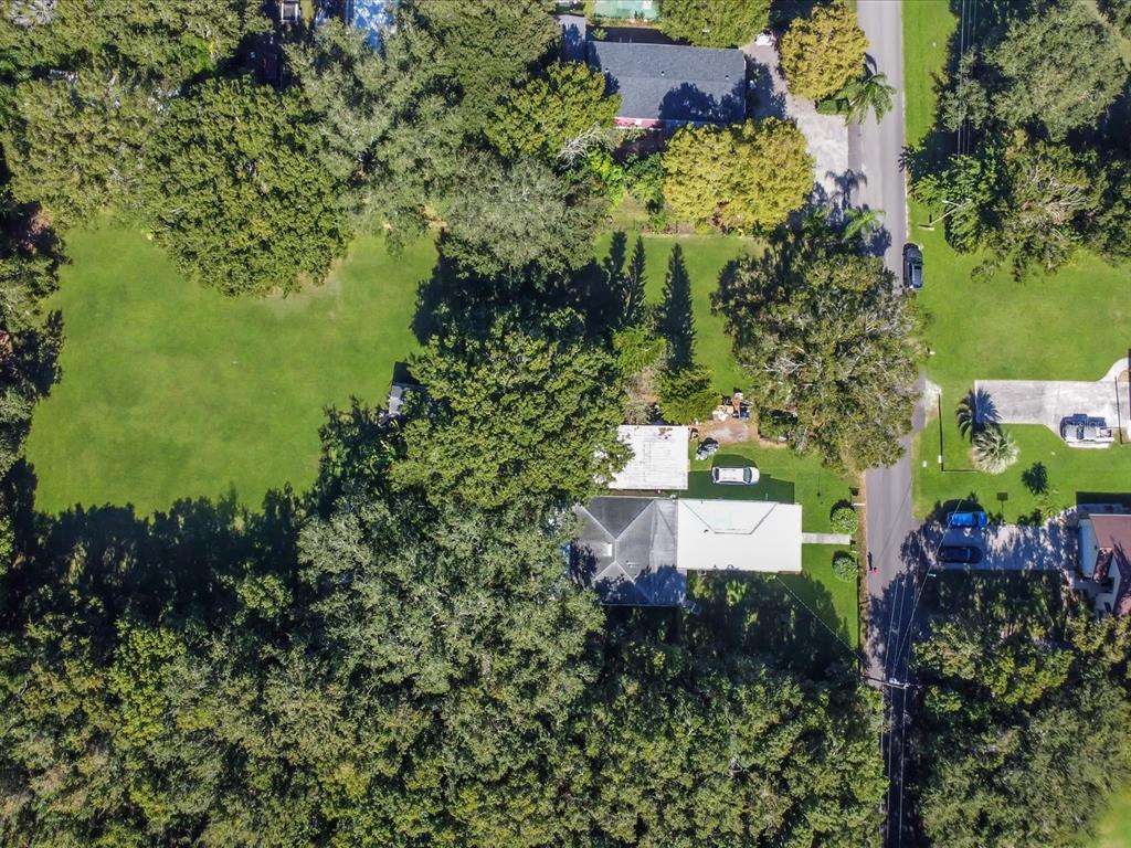 420 Jacks Memorial Road St. Cloud, FL 34769 - Photo 30 of 37 an aerial view of a house with a yard