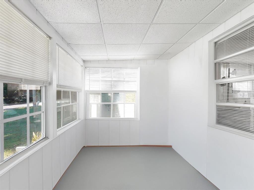 420 Jacks Memorial Road St. Cloud, FL 34769 - Photo 4 of 37 a view of an empty room with a window