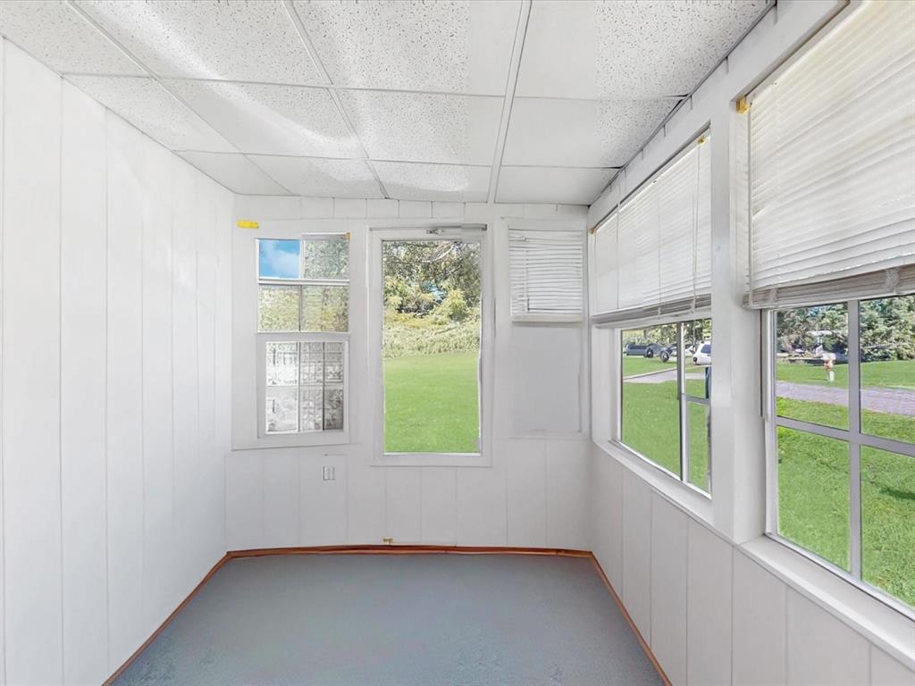 420 Jacks Memorial Road St. Cloud, FL 34769 - Photo 5 of 37 a view of an empty room with a window