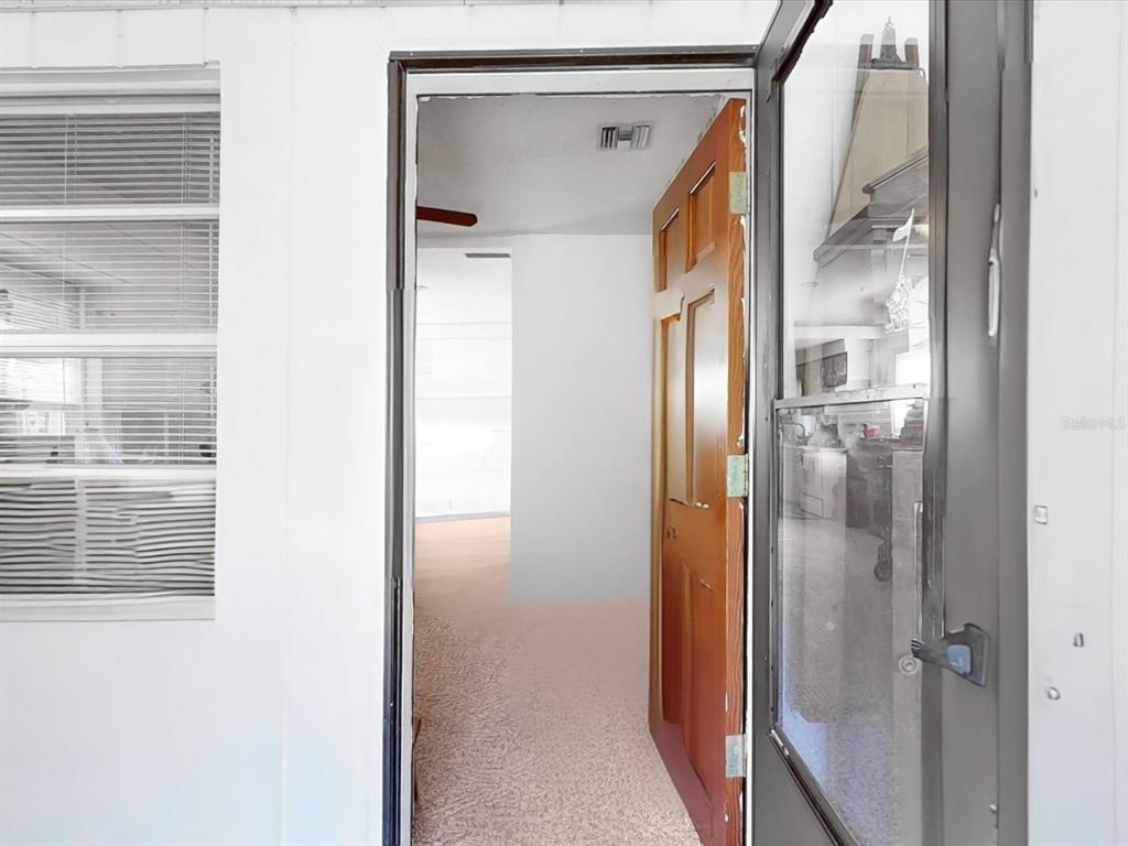 420 Jacks Memorial Road St. Cloud, FL 34769 - Photo 6 of 37 a view of elevator with mirror