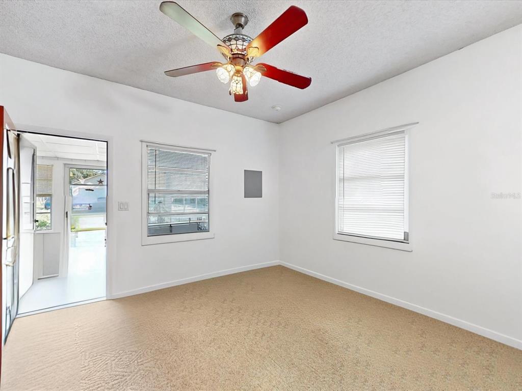 420 Jacks Memorial Road St. Cloud, FL 34769 - Photo 8 of 37 a view of an empty room with a window