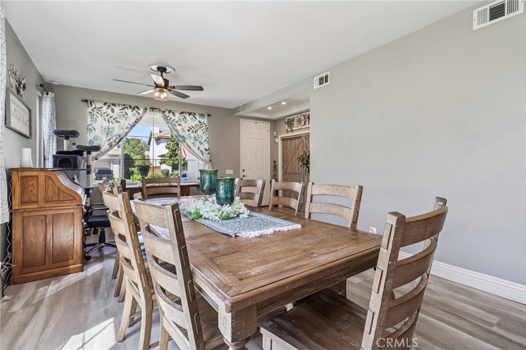 31461 Congressional Drive Temecula, CA 92591 - Photo 17 of 69 a view of a dining room with furniture window and outside view