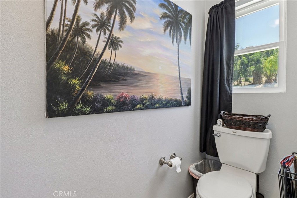 31461 Congressional Drive Temecula, CA 92591 - Photo 50 of 69 a white toilet sitting next to a shower