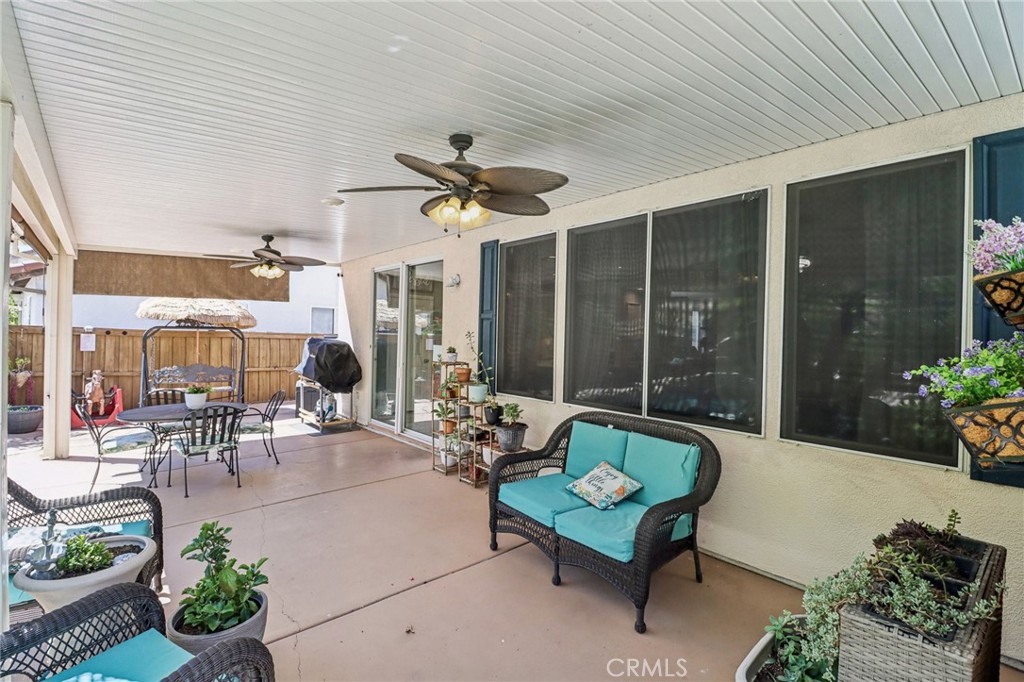 31461 Congressional Drive Temecula, CA 92591 - Photo 56 of 69 a building outdoor space with patio furniture and potted plants