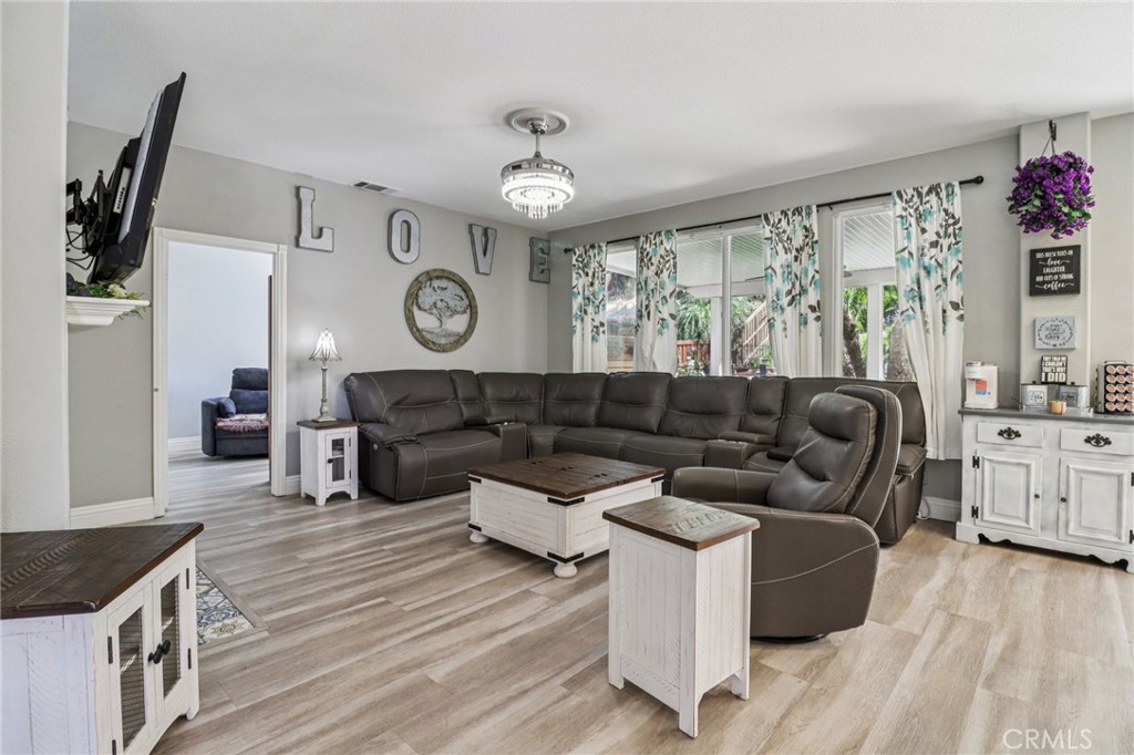 31461 Congressional Drive Temecula, CA 92591 - Photo 9 of 69 a living room with furniture and a large window