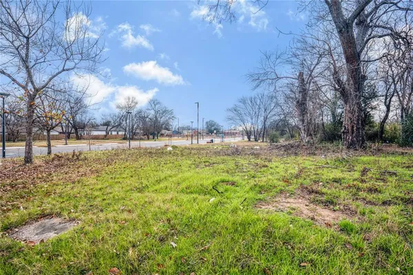 a view of outdoor space with deck and yard
