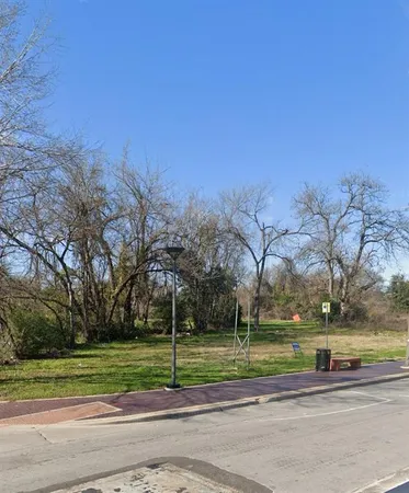 a view of swimming pool with a yard