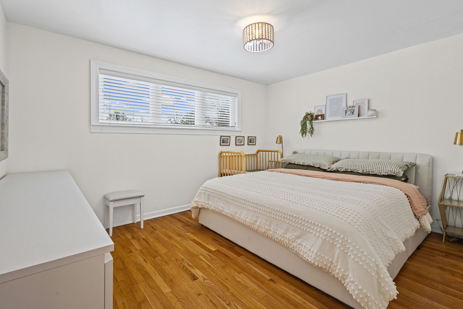 42 West Taylor Road Lombard, IL 60148 - Photo 13 of 36 a bedroom with a bed and a window