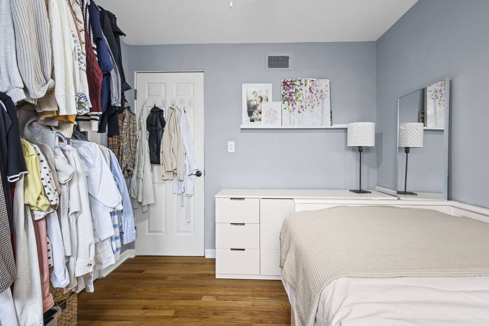 42 West Taylor Road Lombard, IL 60148 - Photo 21 of 36 a bedroom with a bed and a walk in closet