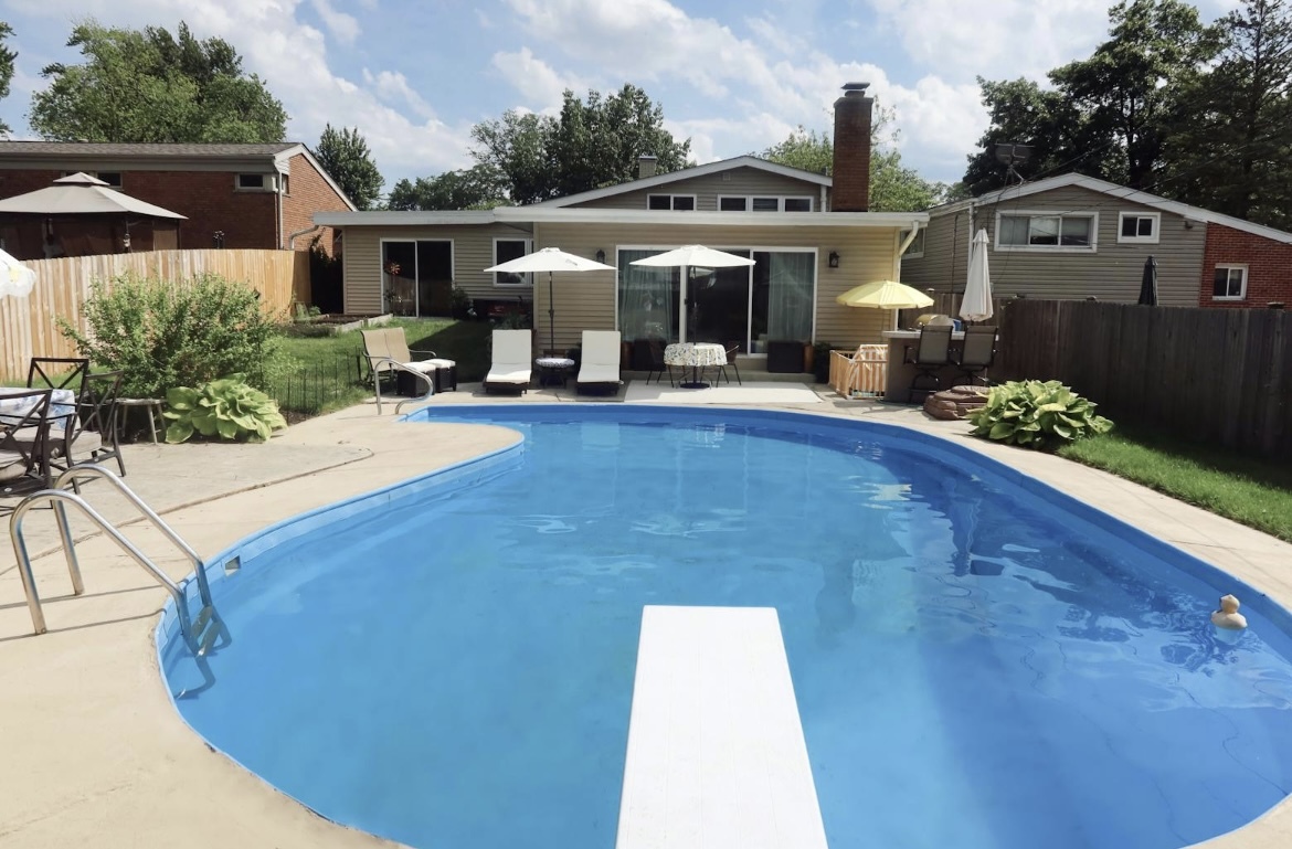 42 West Taylor Road Lombard, IL 60148 - Photo 27 of 36 a view of house and outdoor space with swimming pool