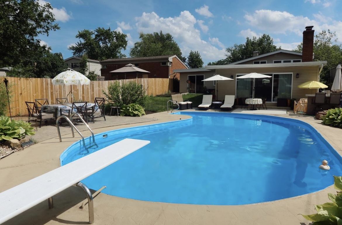 42 West Taylor Road Lombard, IL 60148 - Photo 28 of 36 a view of a swimming pool and lounge chairs