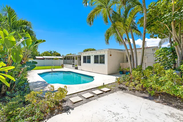 a view of outdoor space and swimming pool