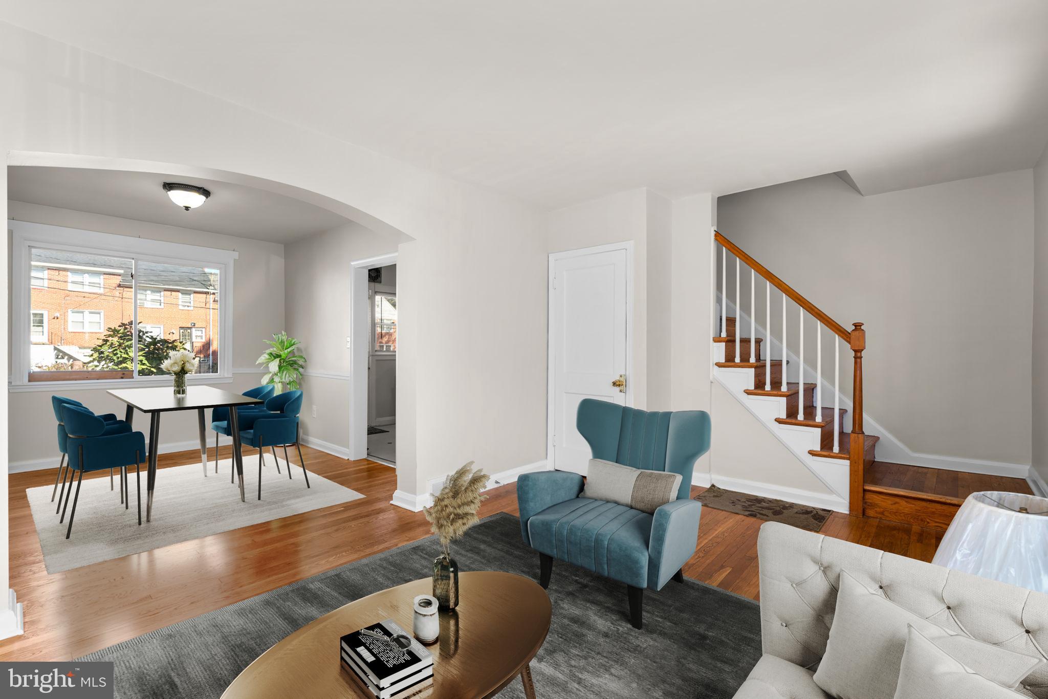 1420 Cedarcroft Road Baltimore, MD 21239 - Photo 5 of 28 a living room with furniture and a table
