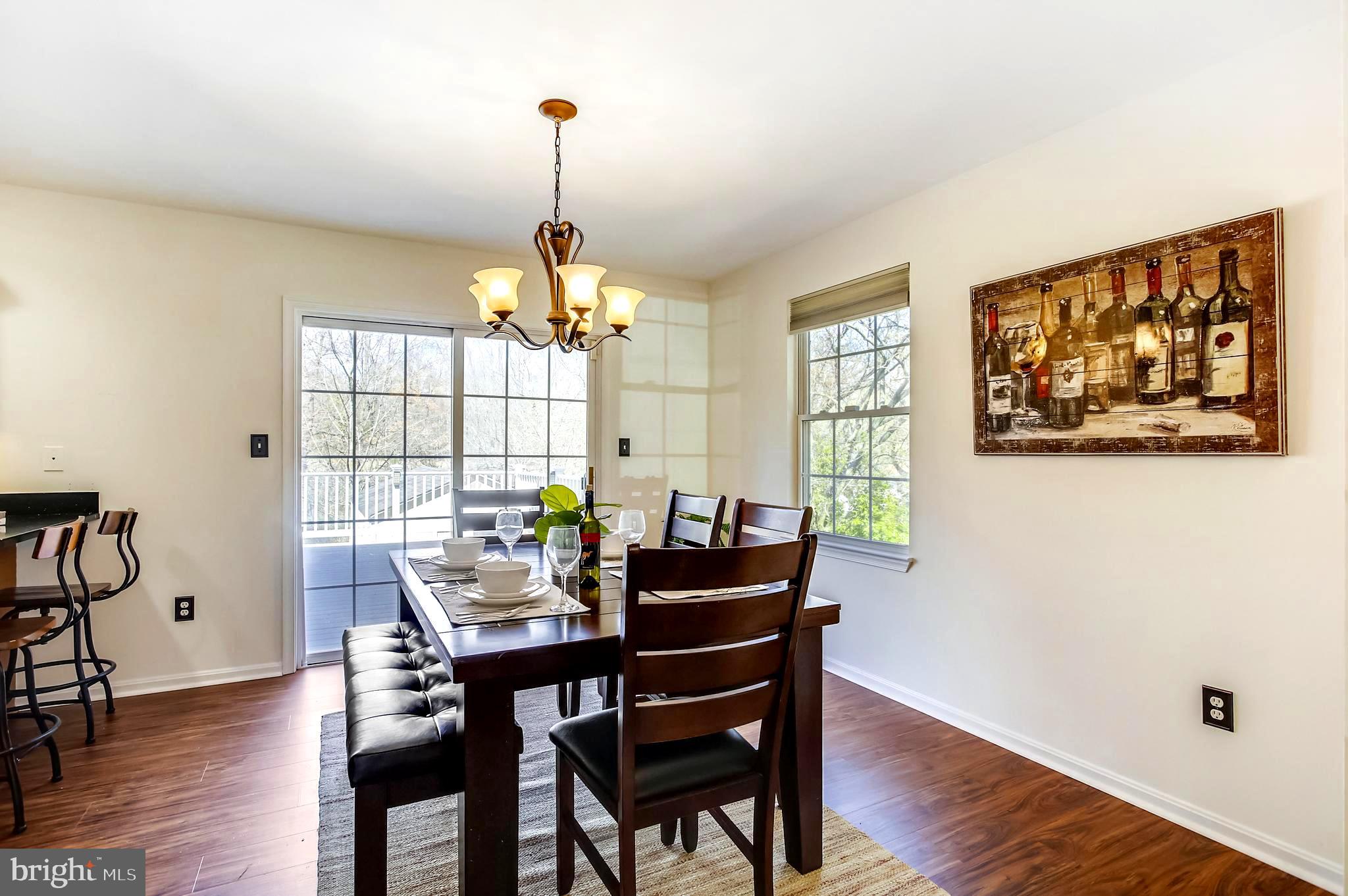 1662 Cape May Road Baltimore, MD 21221 - Photo 6 of 37 Dining Area with sliding doors to large rear deck